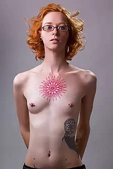 Tatted And Pierced Redhead