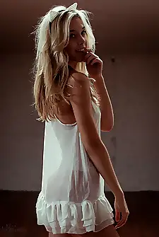 Alexis Ren in white lingerie and ears