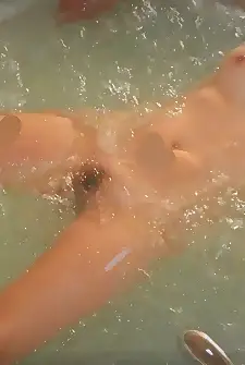 Wife enjoys when the bubbles massage her pussy and make her tits quiver