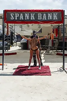 Burning man is a haven for spanking Photographer