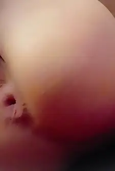Biting her lip