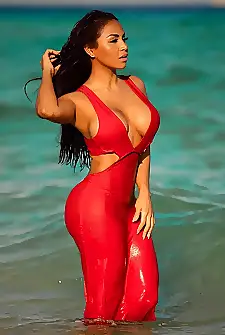 Dolly Castro wearing red and wet